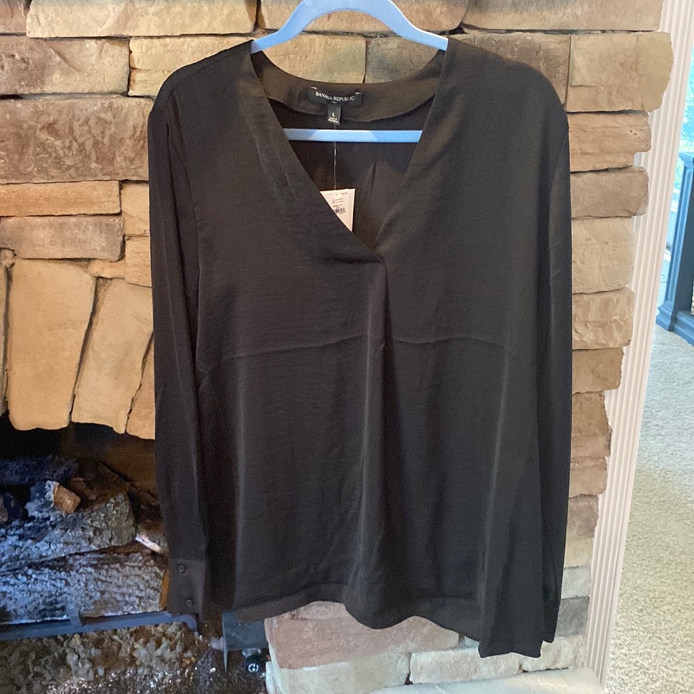 Black long sleeve 100% polyester top from Banana Republic. NWT